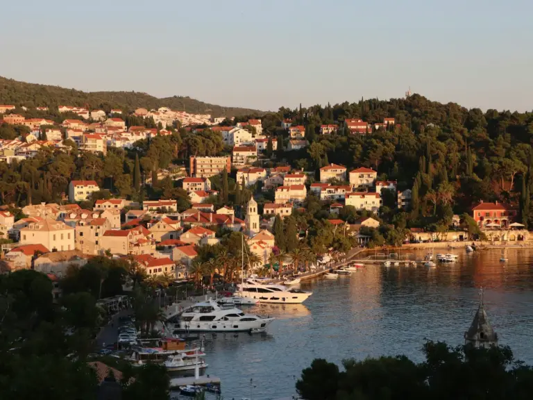 Cavtat harbour with boats and hillside houses near Dubrovnik