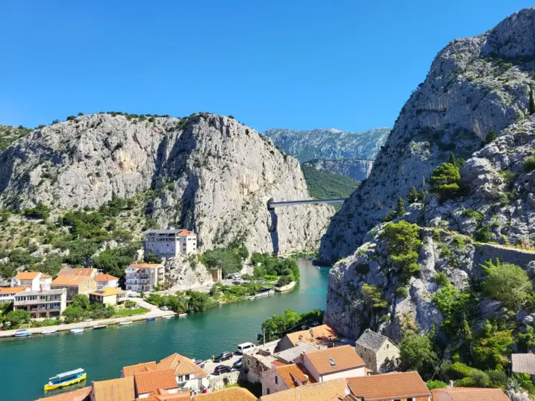 Omiš and the Cetina river flowing through the canyon to the sea