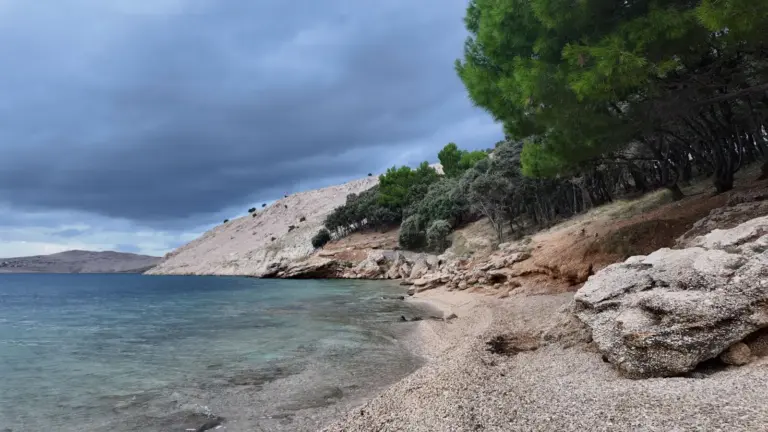 Quiet beach with clear water on the island of Pag